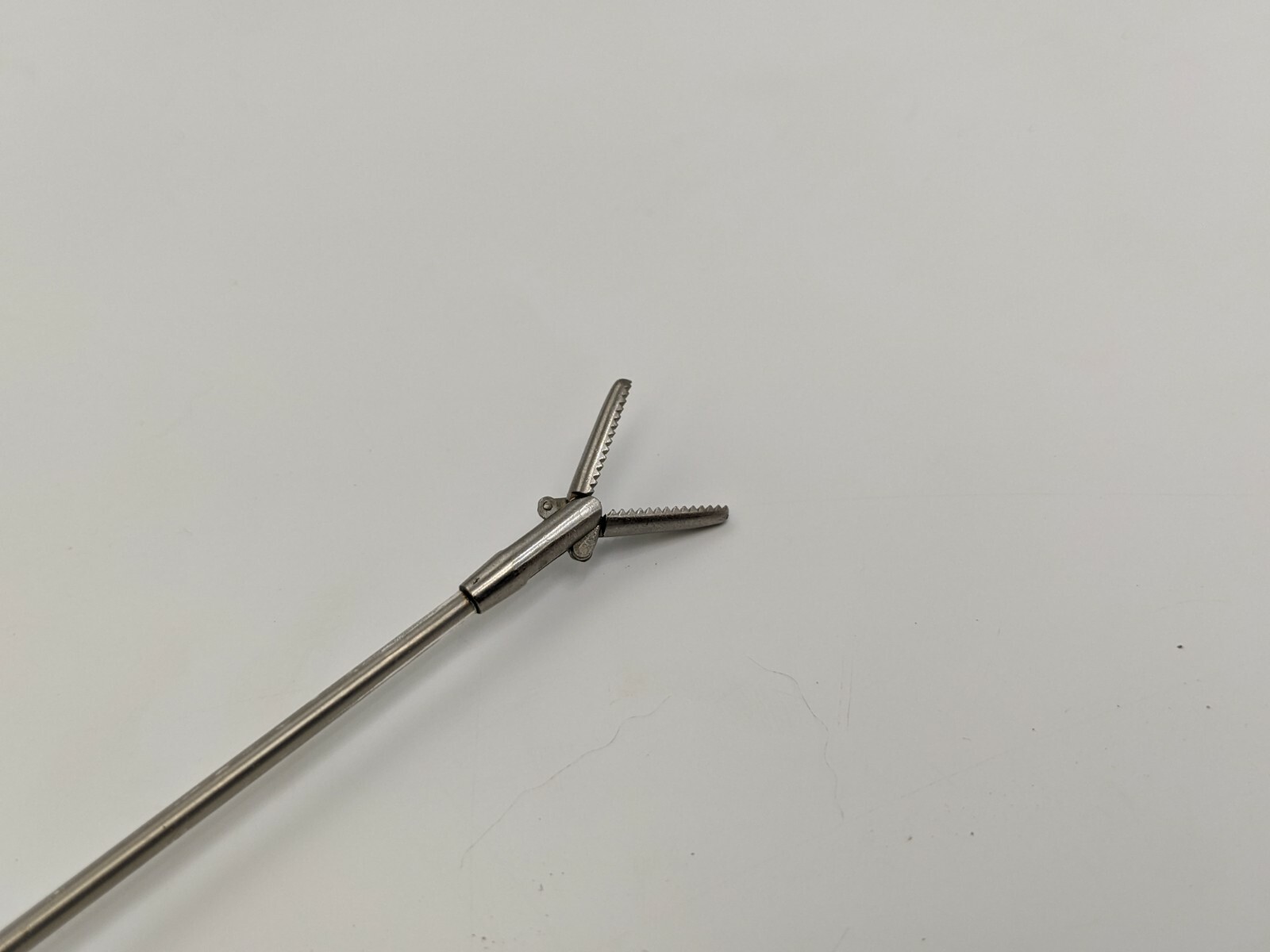 Pilling 505015 Serrated Grasping Forceps Jaws Center Action Insulated Stem SS