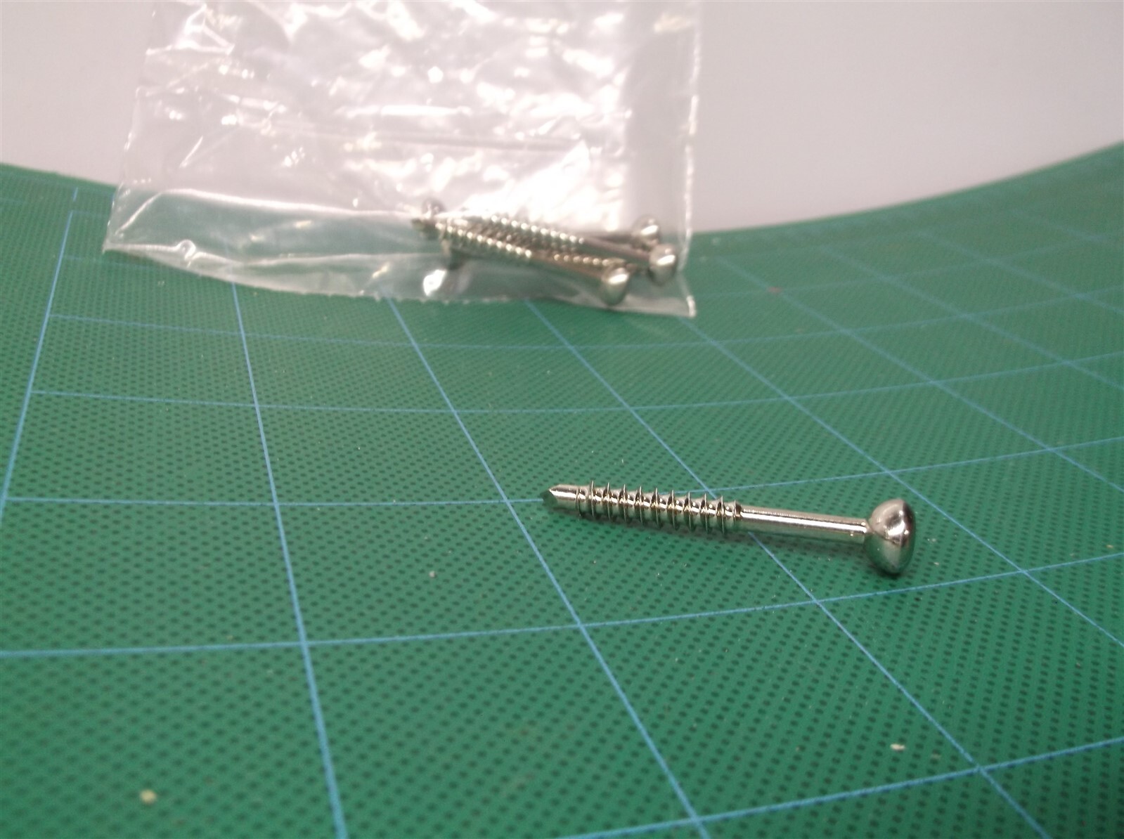 lot of 6 1-5/8″ x 1/8″ surgical screws with 3.5mm hex head